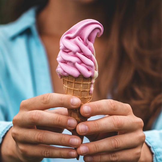 lady holding ice cream cone